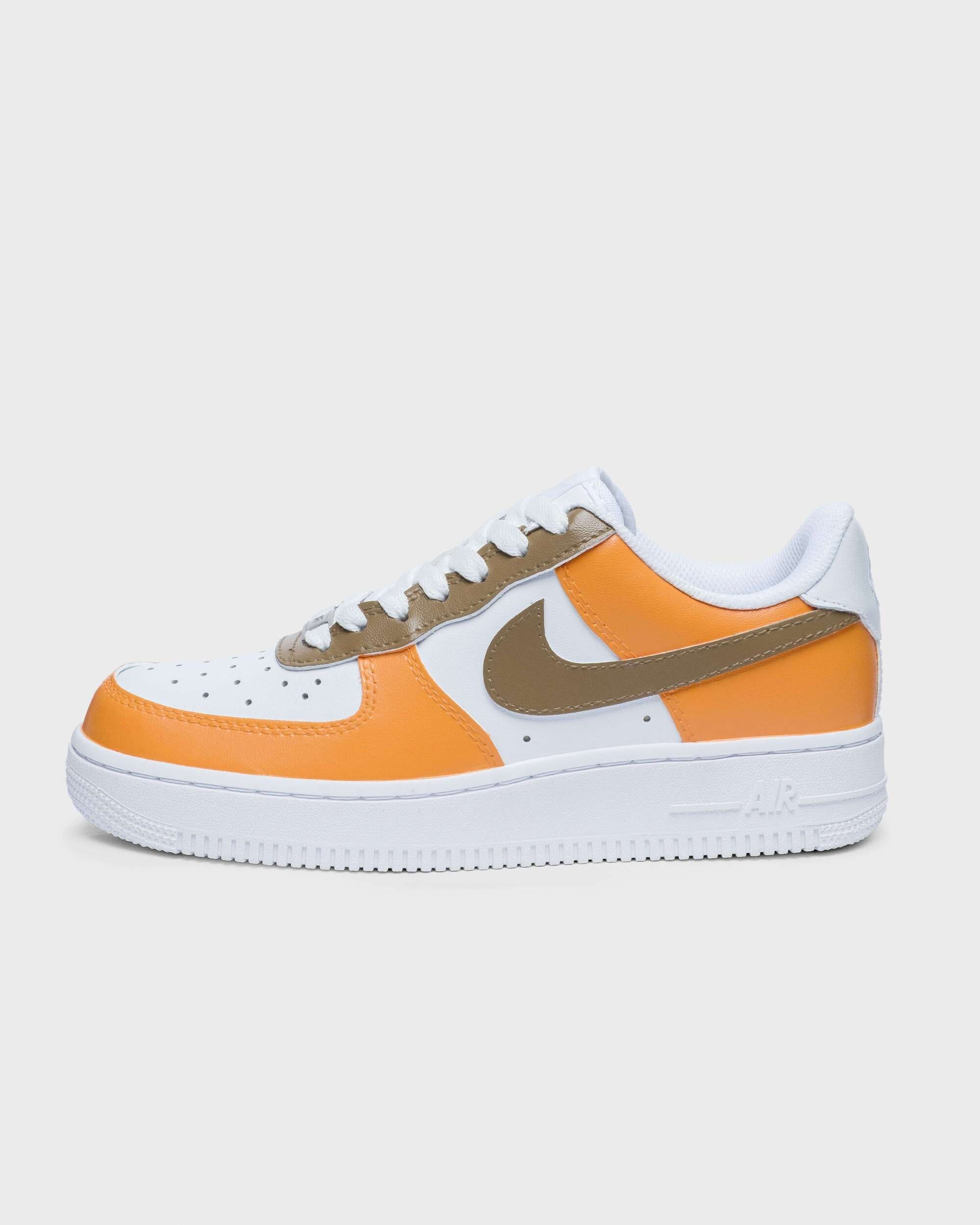 Side profile of custom Air Force 1 sneaker with orange and brown accents on a white base, ideal for a bold and colorful personalized design.