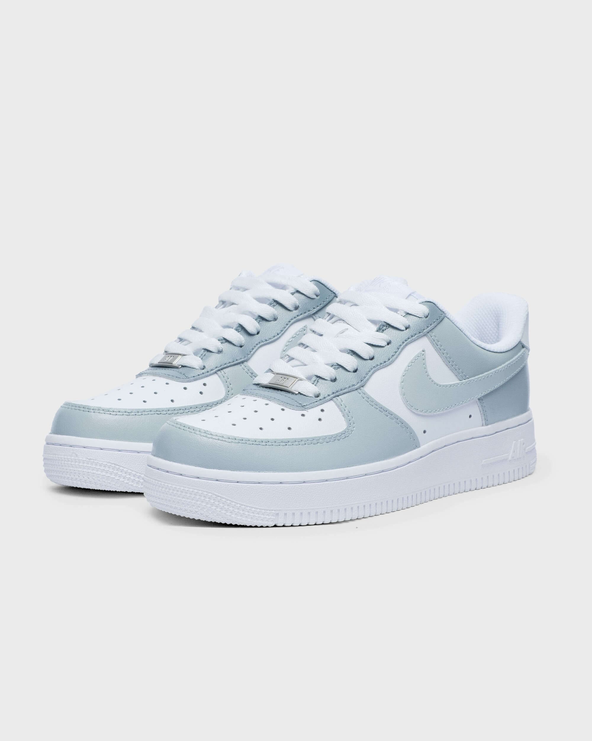 Side view of custom Air Force 1 sneaker with a soft gray swoosh and light gray overlays, perfect for a subtle yet stylish, personalized design.